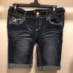 Cuffed jean shorts. Dark wash with white stitching